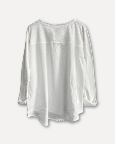 The back side of a long sleeves t-shirt with buttons