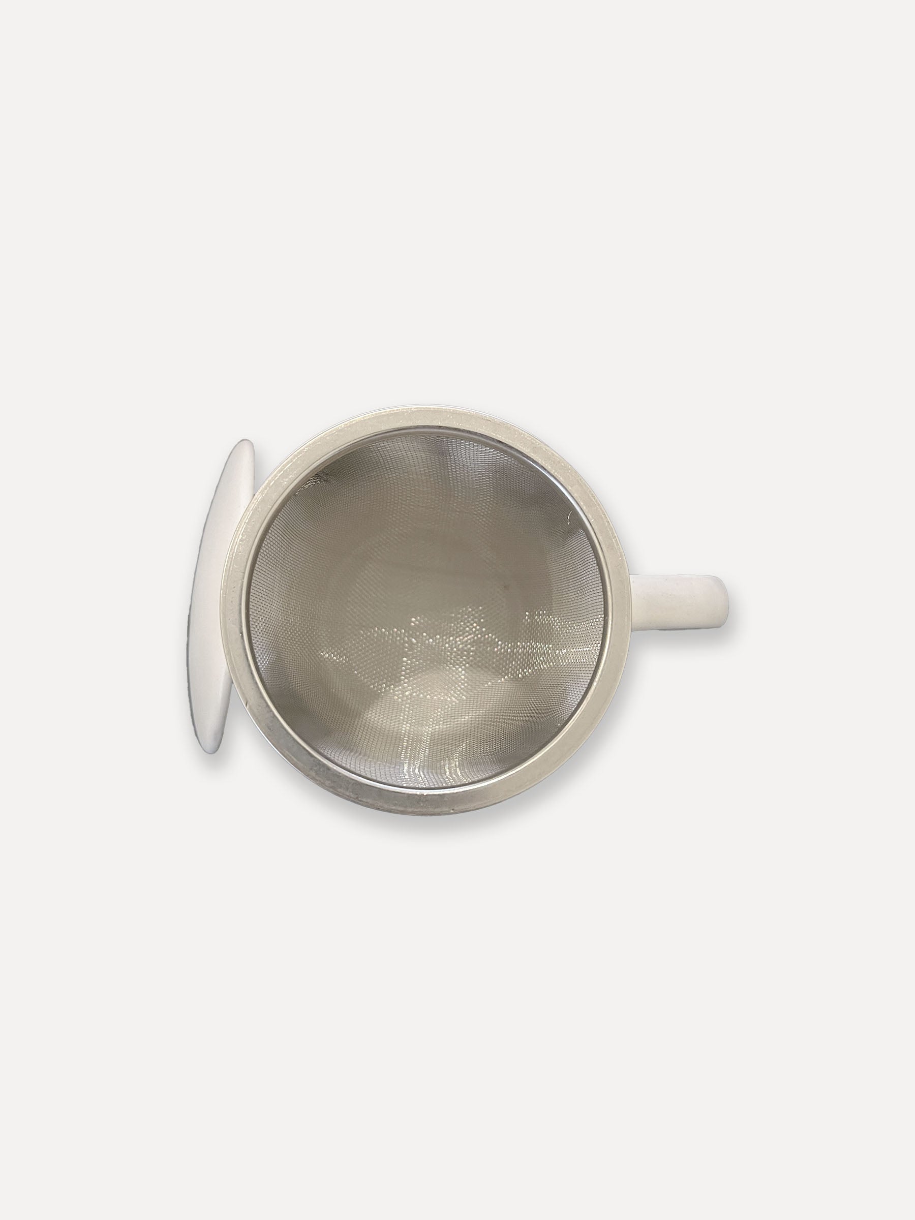 Tazza di tè con filtro, bianco